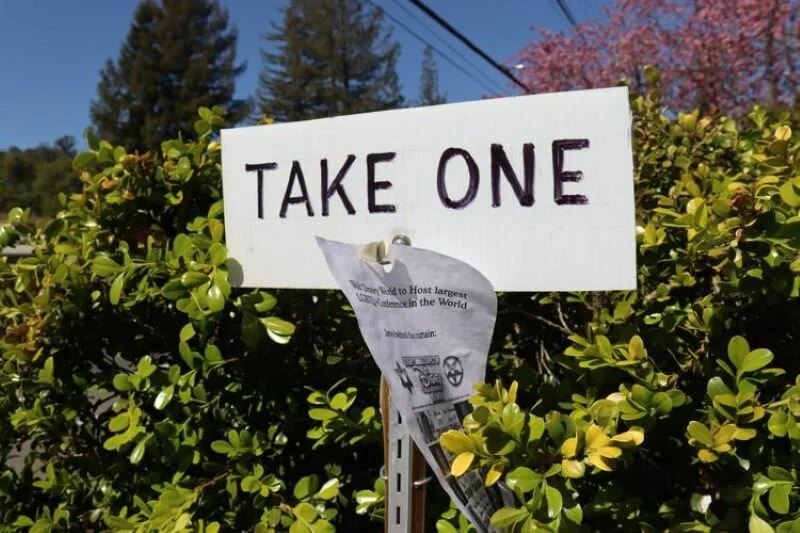 A sign on Browns Valley Road in Napa urges passersby to pick up anti-Semitic flyers. Edward Booth, Register